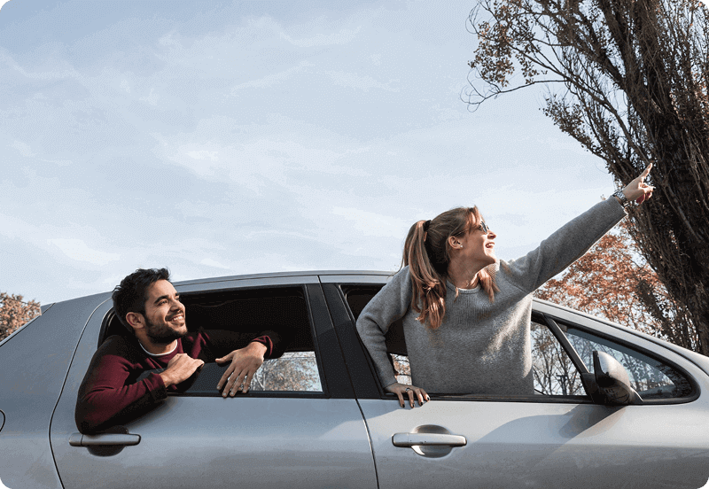 Friends exploring Spain in their insured car
