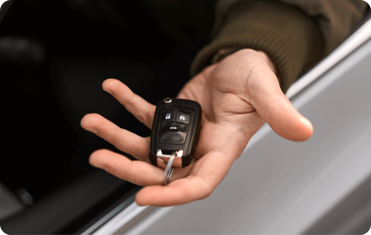 Someone holding the car keys