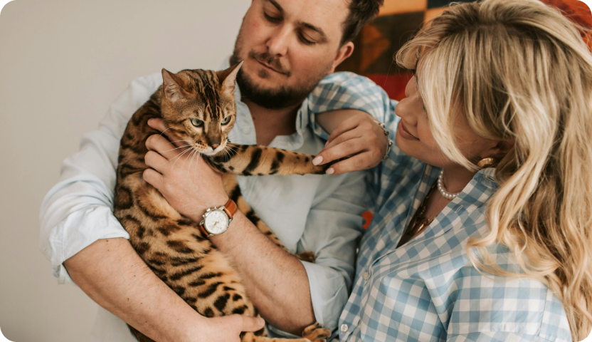 family holding a cat