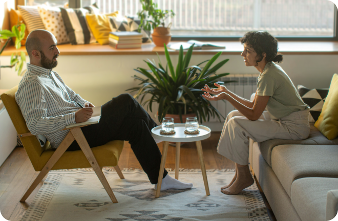 two people discussing sitting