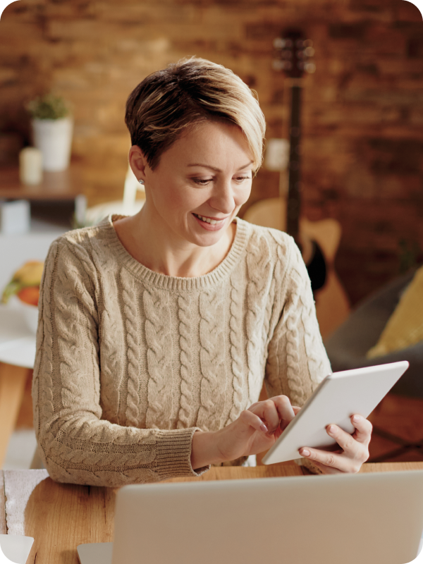 Woman looking at her tablet.