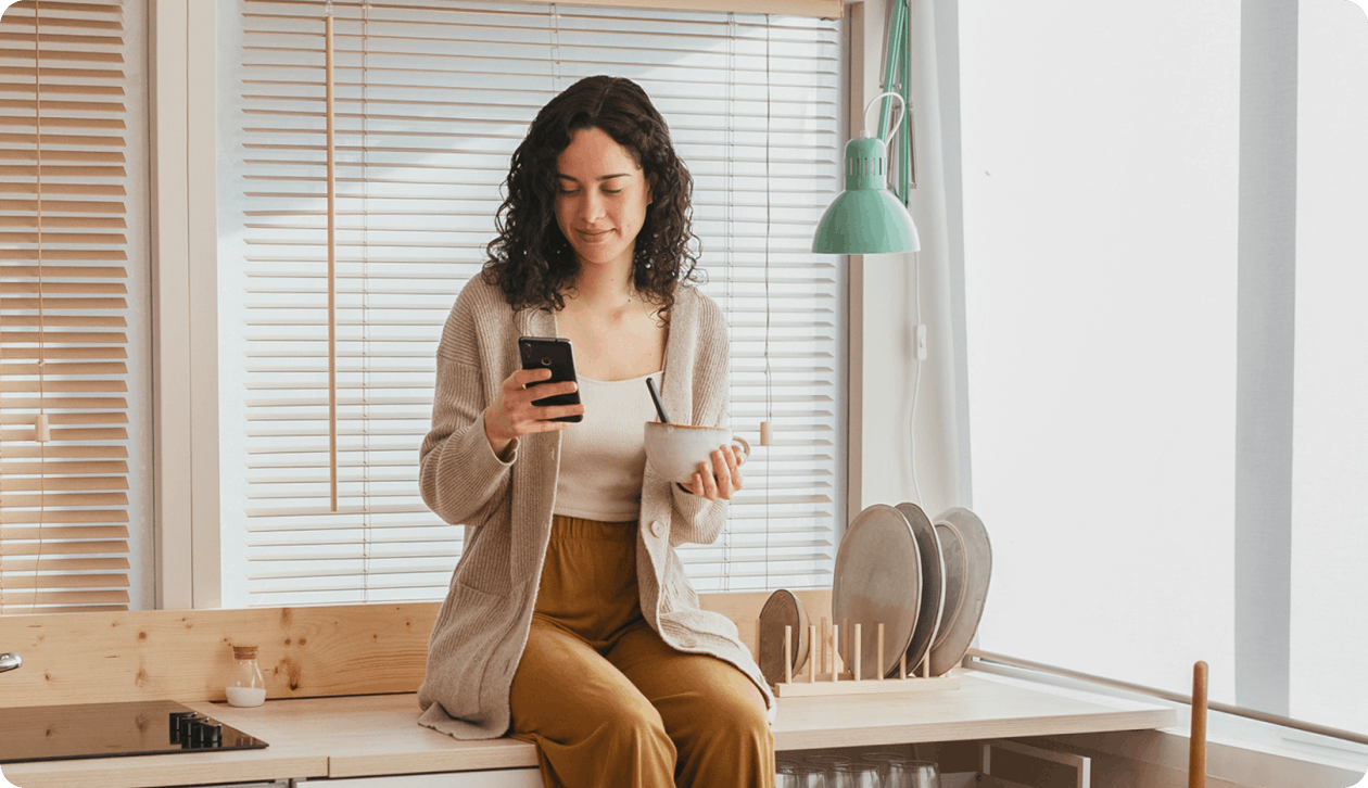 Woman checking her policies on a mobile.