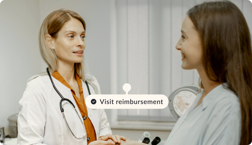 A doctor talking to her patient at a private hospital in Portugal.