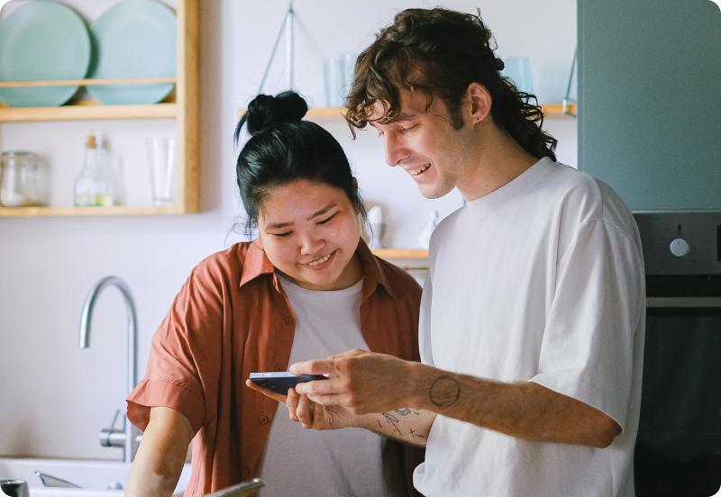 Two expats comparing Japanese health insurance options 