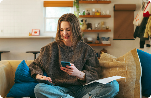 A female user submitting a claim on Feather's mobile app