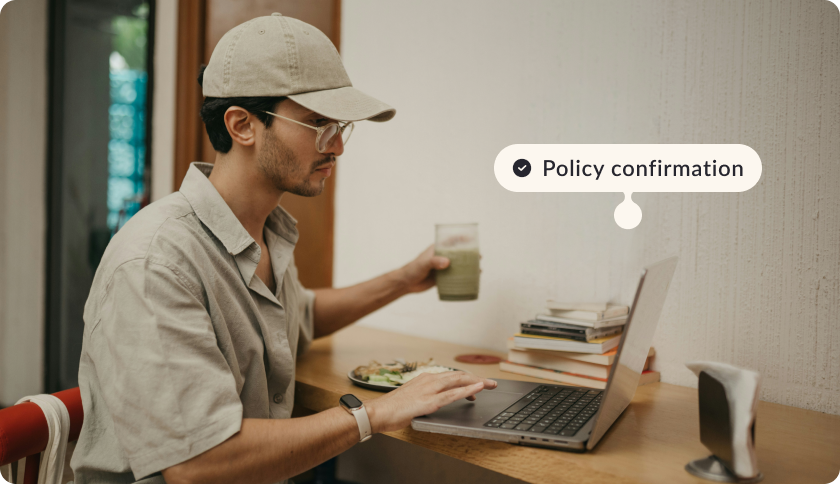 An expat in Portugal buying an insurance policy on his laptop.