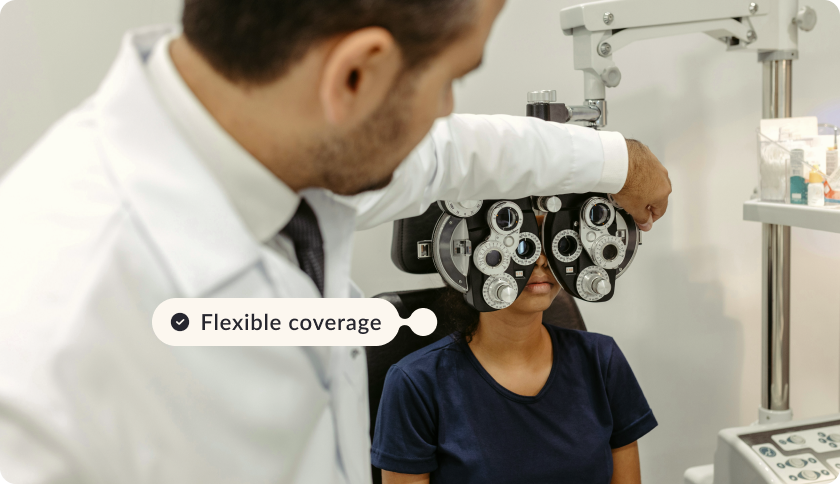 An ophthalmologist diagnosing his patient. The tag reads "Flexible coverage". 