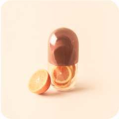 An icon showing a pill and lemon.